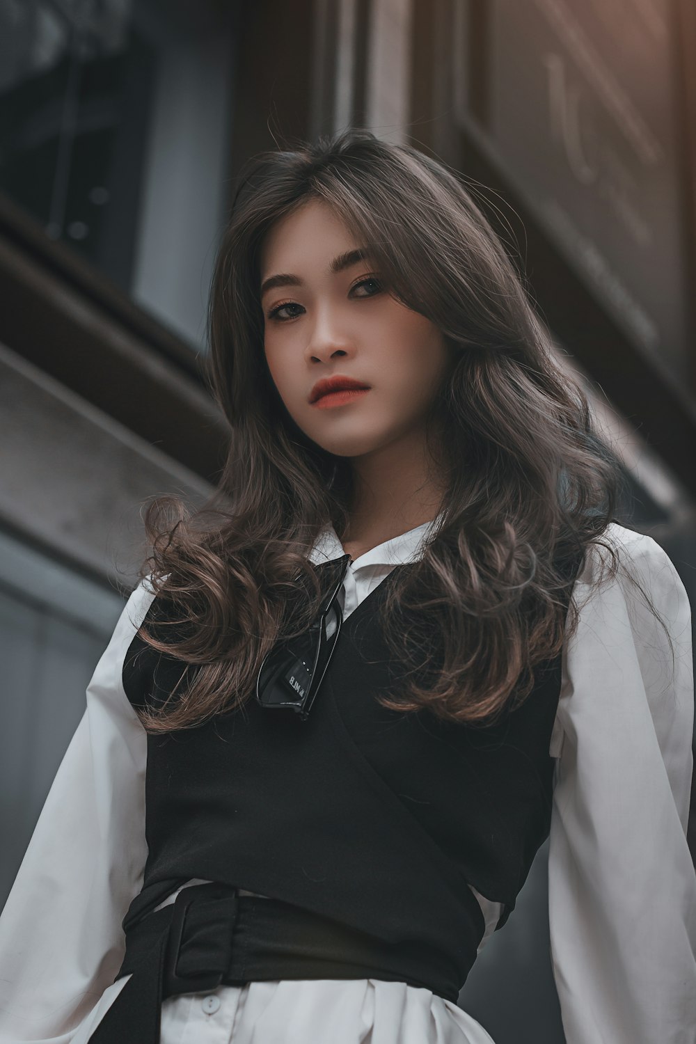 woman in black and white collared shirt