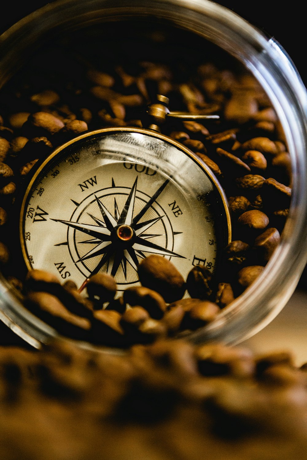 brown coffee beans on clear glass container