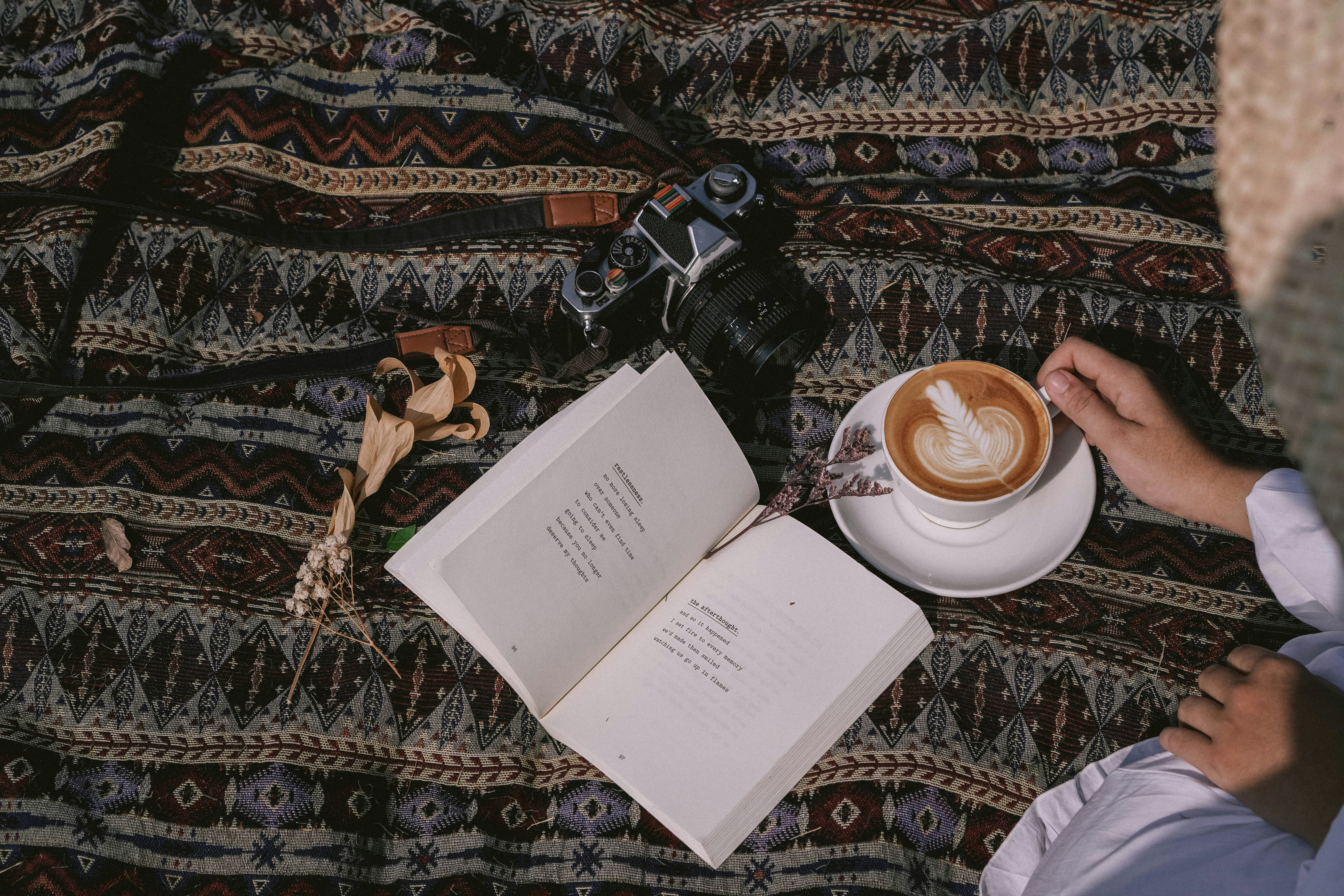 white printer paper on black and white floral textile