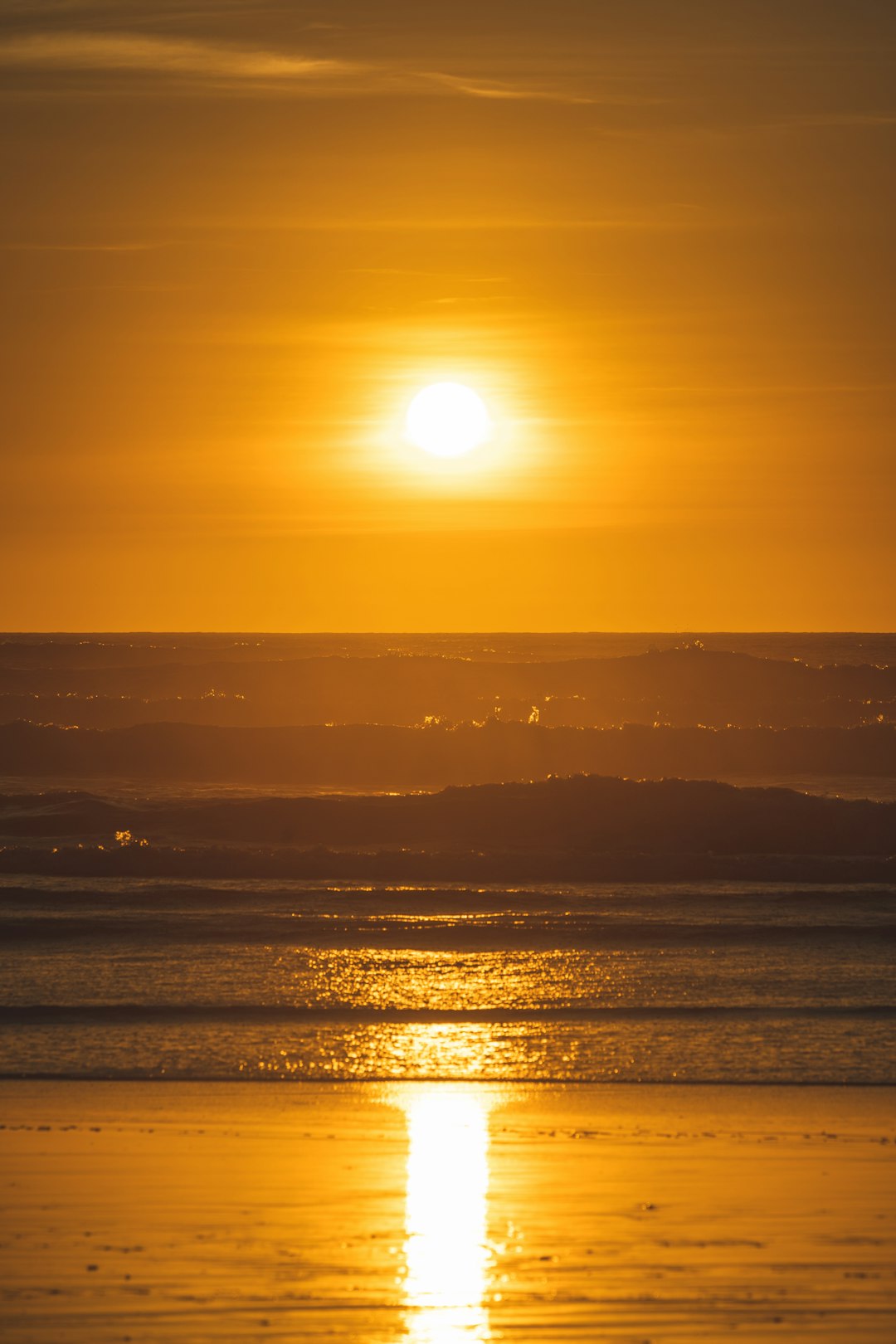 body of water during sunset