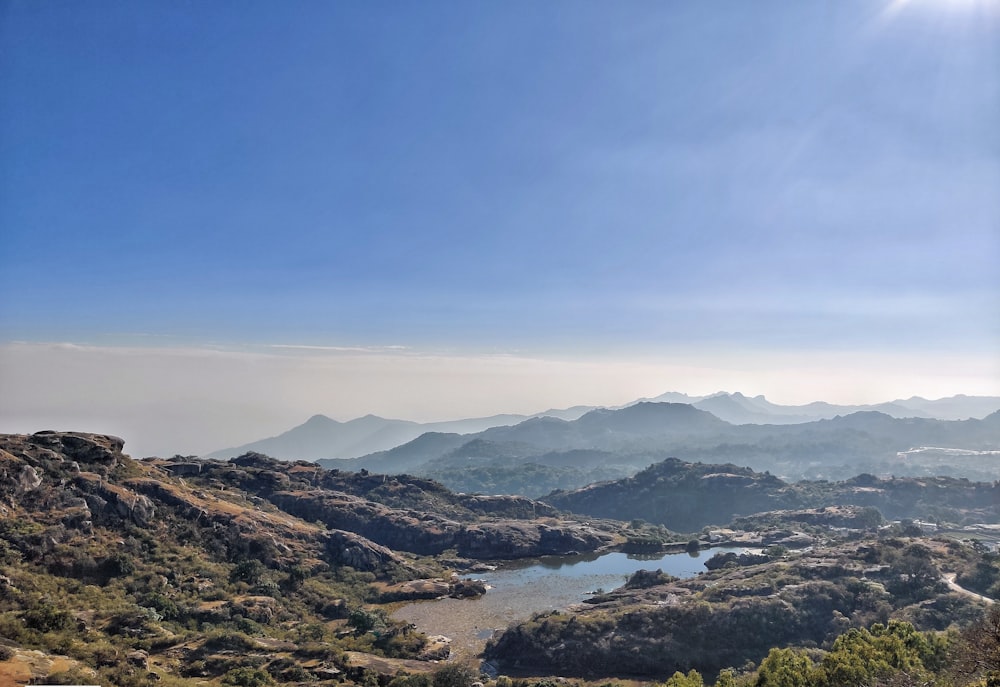 aerial view of mountains and river during daytime