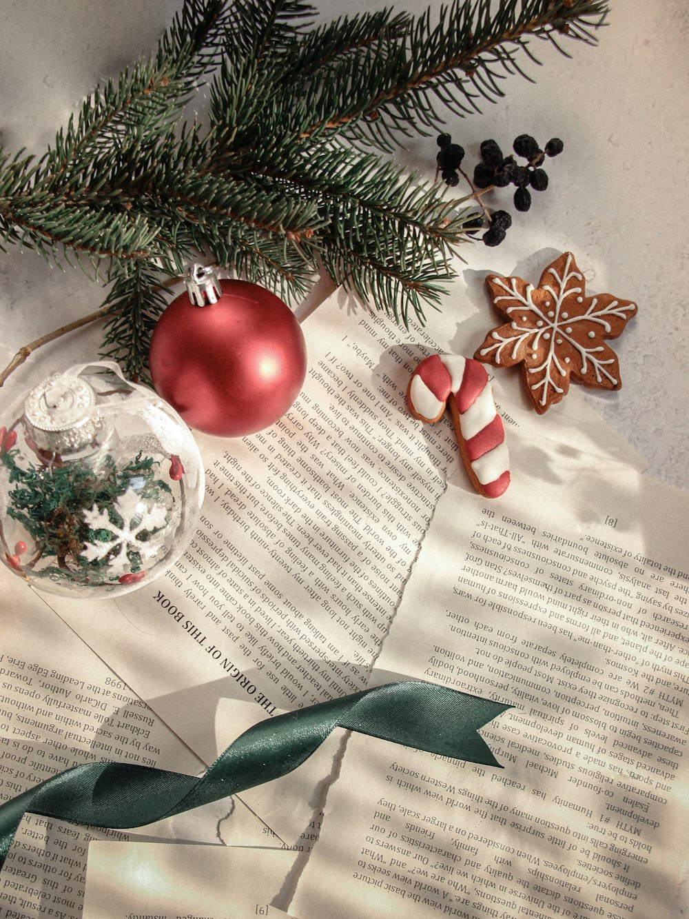 red and white candy cane on clear glass ball