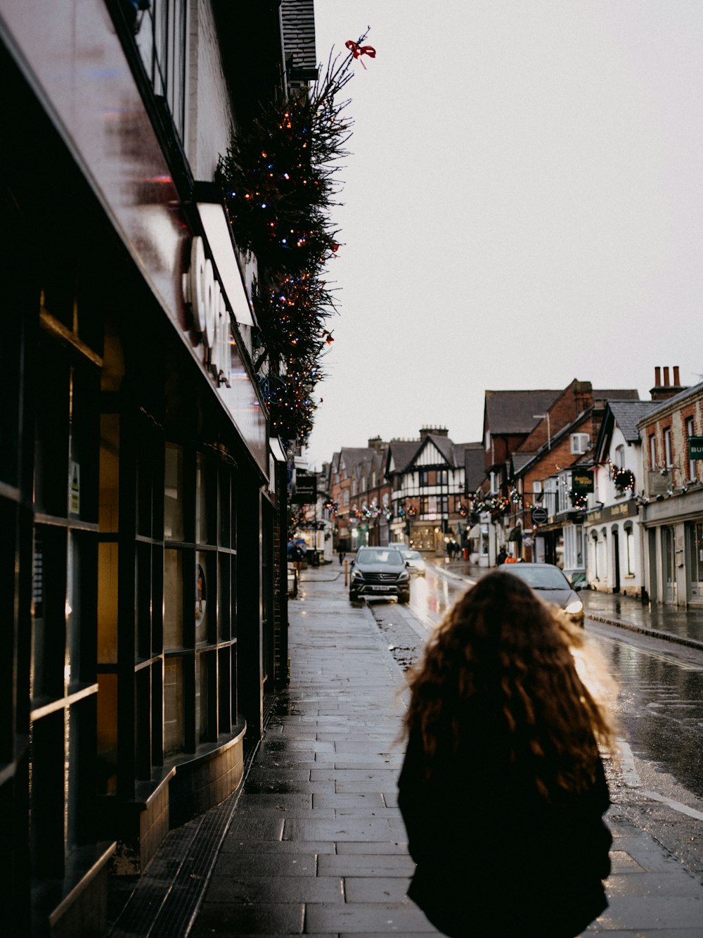 people walking on sidewalk during daytime