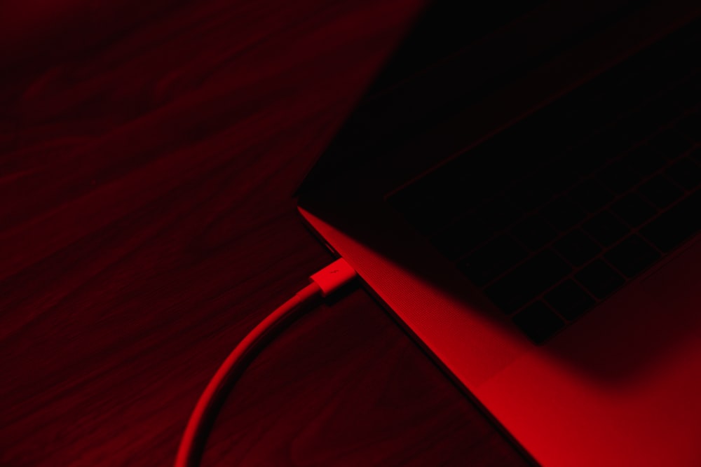 black and red laptop computer