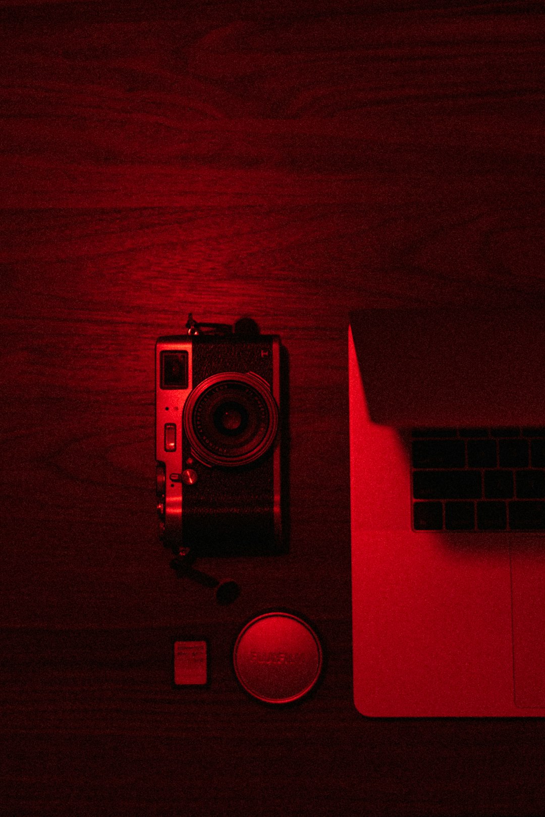 red and black camera on red surface
