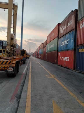 red and blue cargo containers on a sunny day
