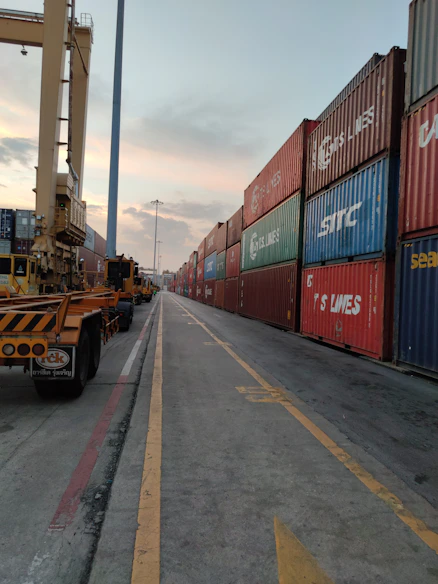 red and blue cargo containers on a sunny day
