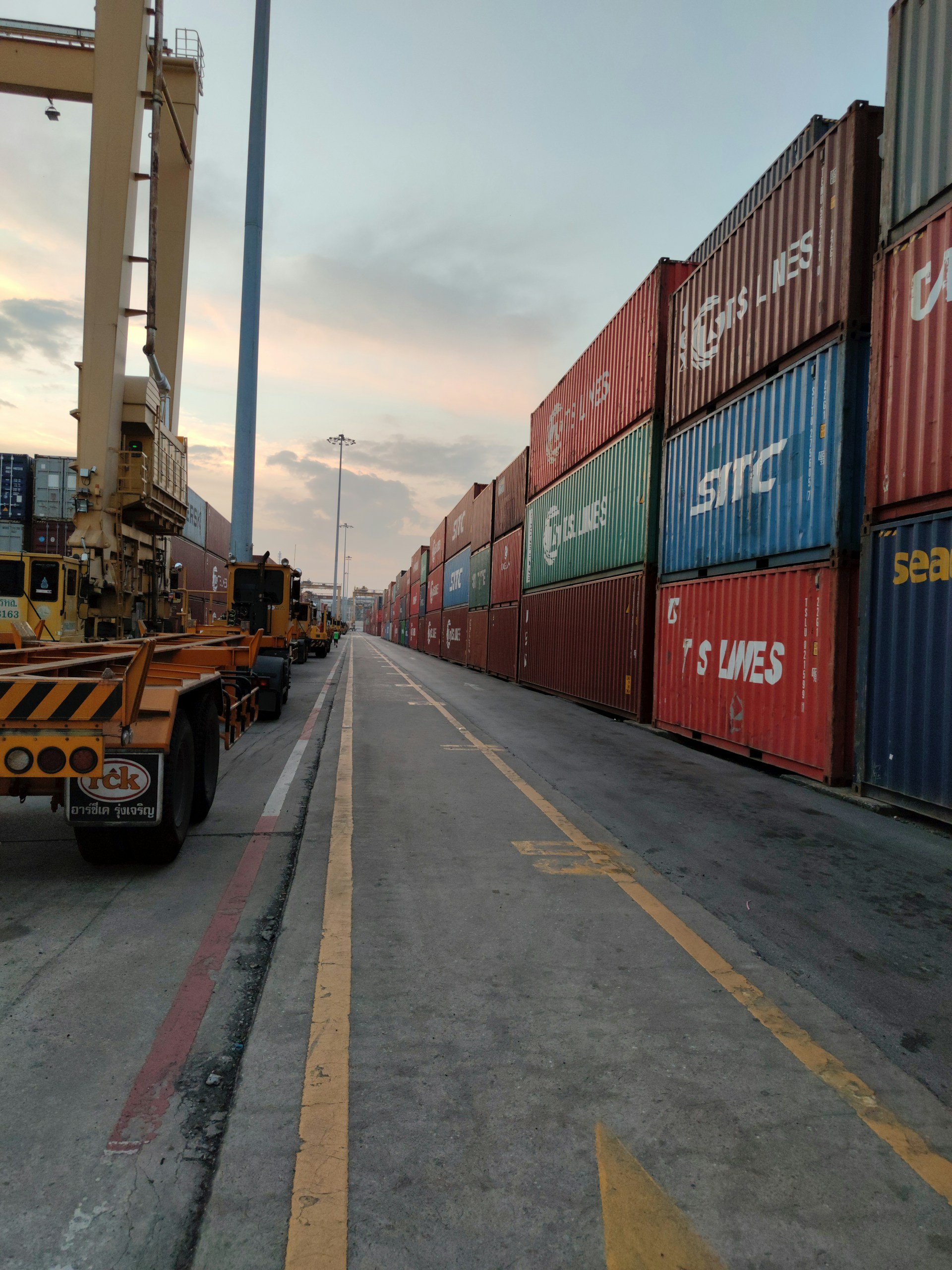 red and blue cargo containers on a sunny day