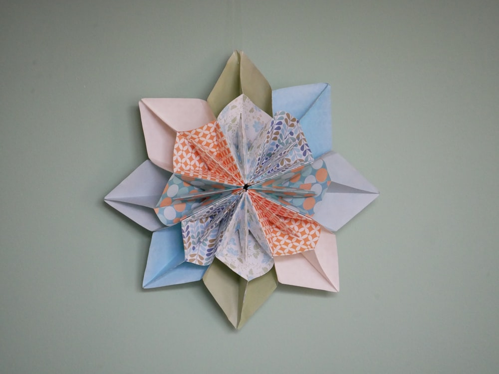 white and blue star origami