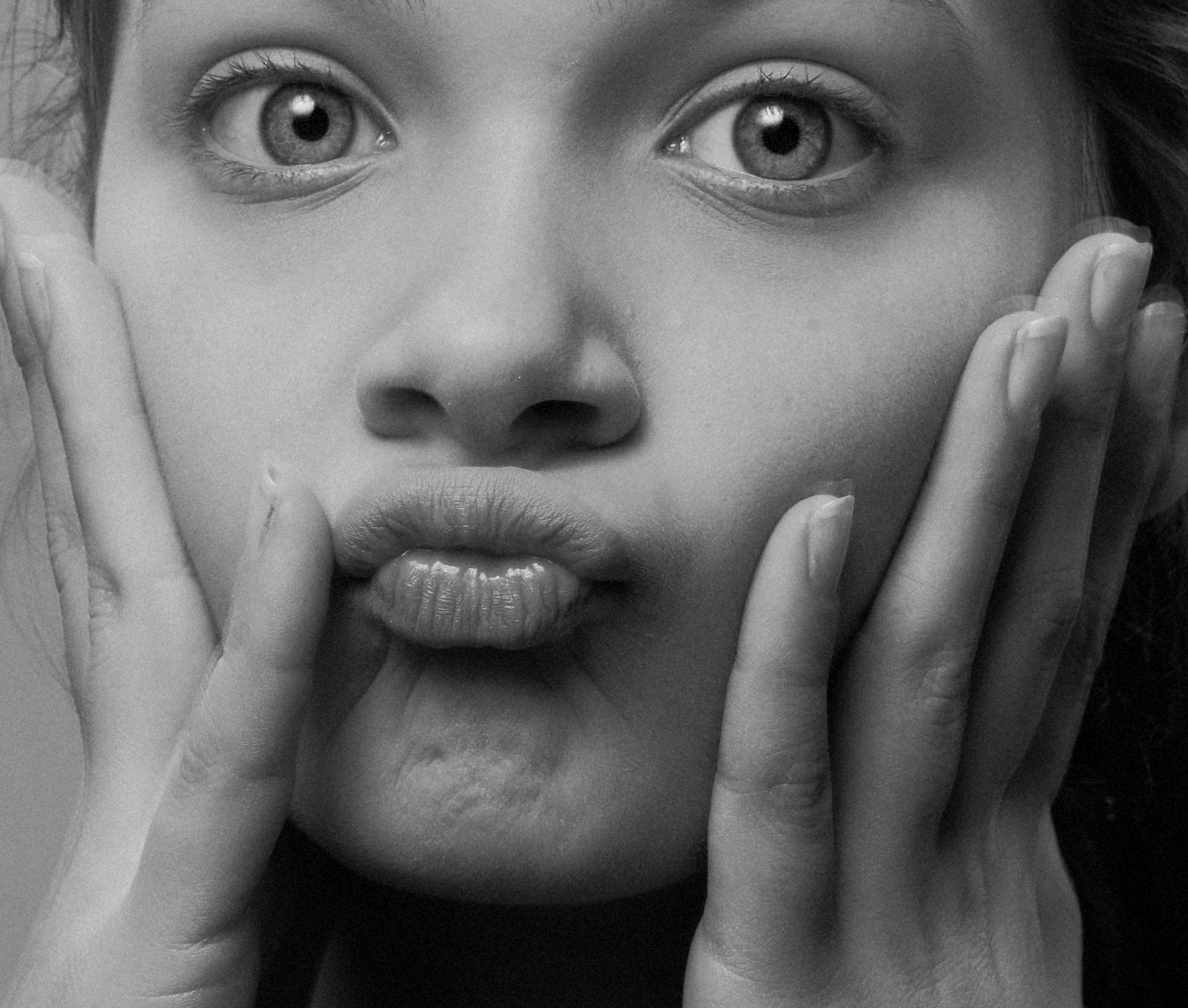 grayscale photo of a woman's face