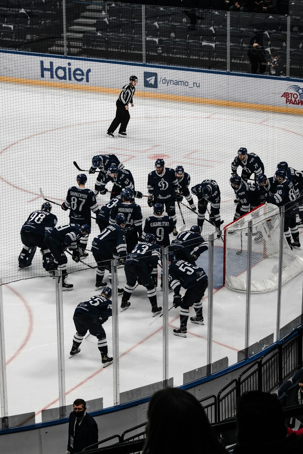 ice hockey players on ice hockey field