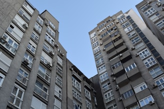Modern residential buildings in Anália Franco with clear blue skies.