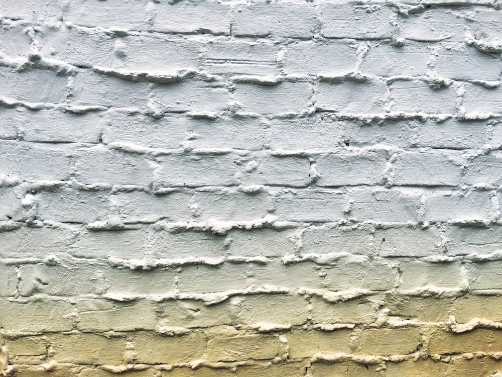 grey concrete brick wall during daytime