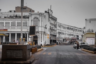 white concrete building near road during daytime