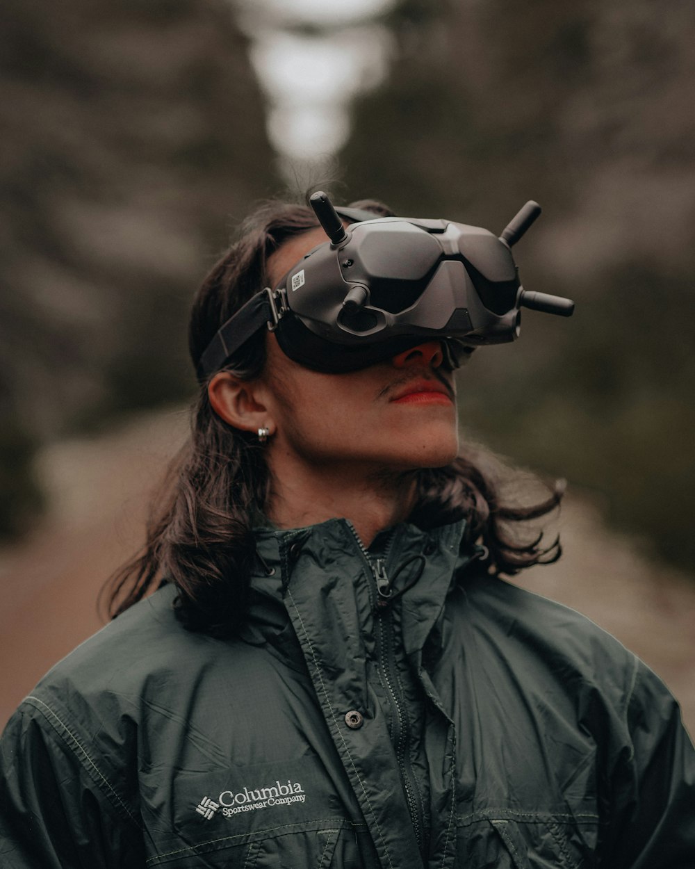 man in black leather jacket wearing black sunglasses