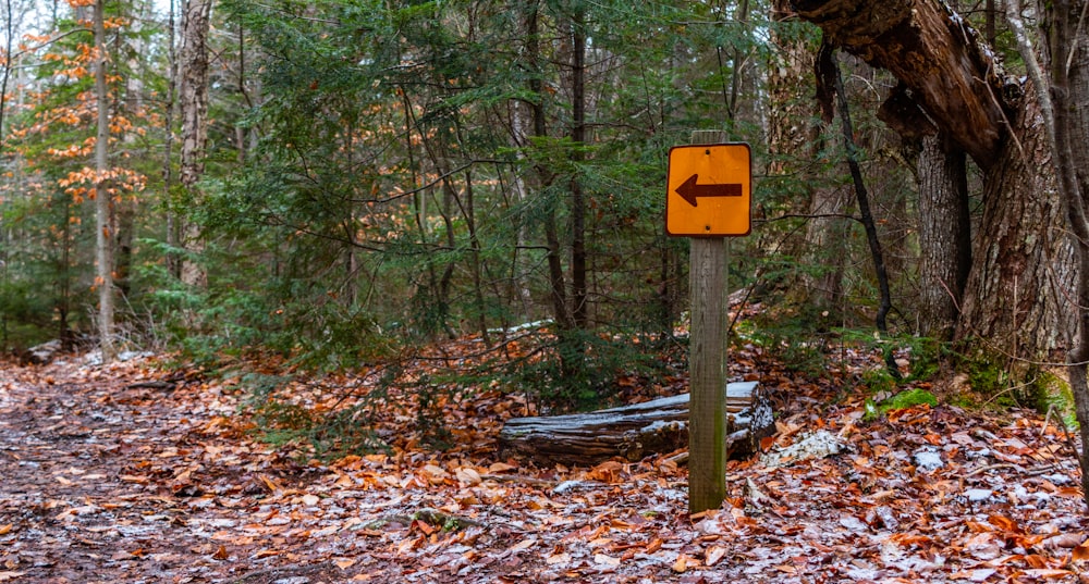 red and black arrow sign