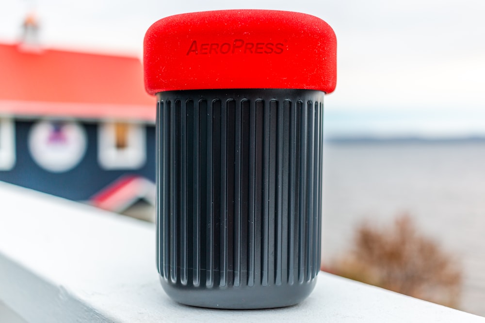 black and red plastic container
