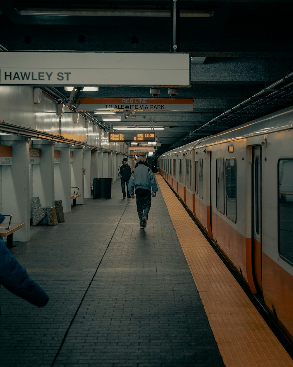 people walking on train station