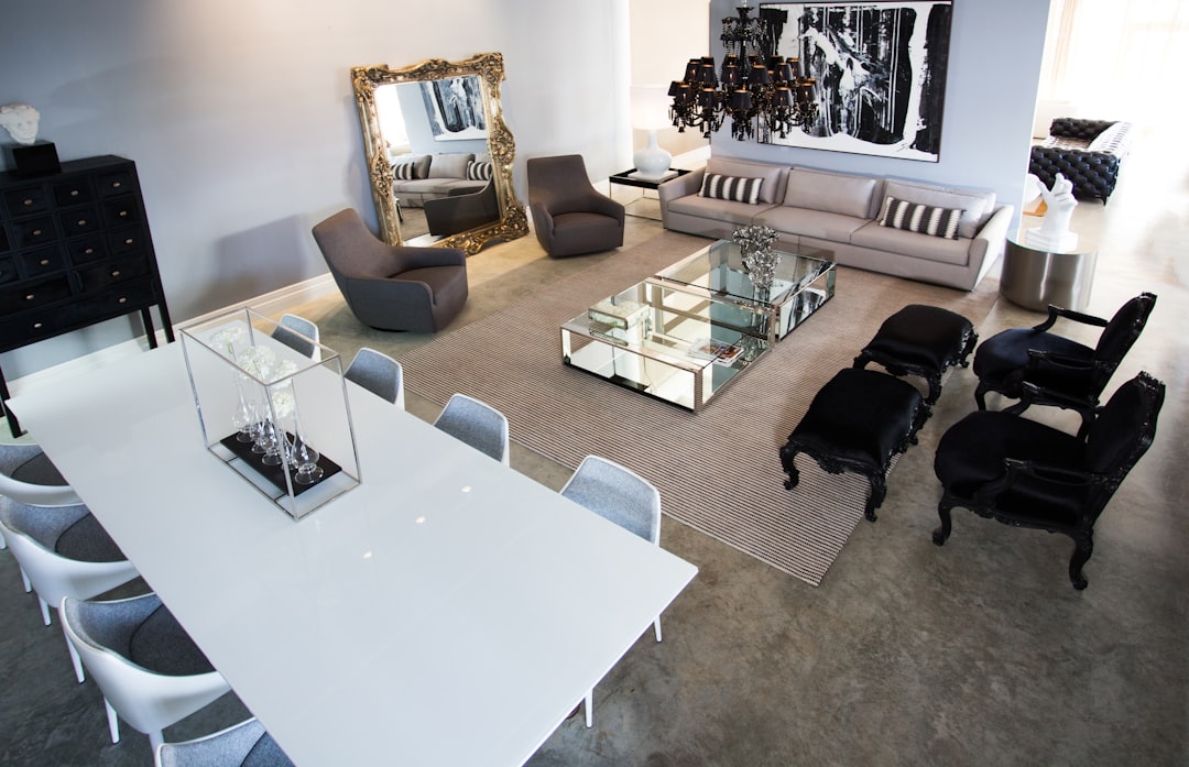 black short coated dog on gray carpet