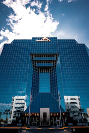 white and blue building under blue sky during daytime