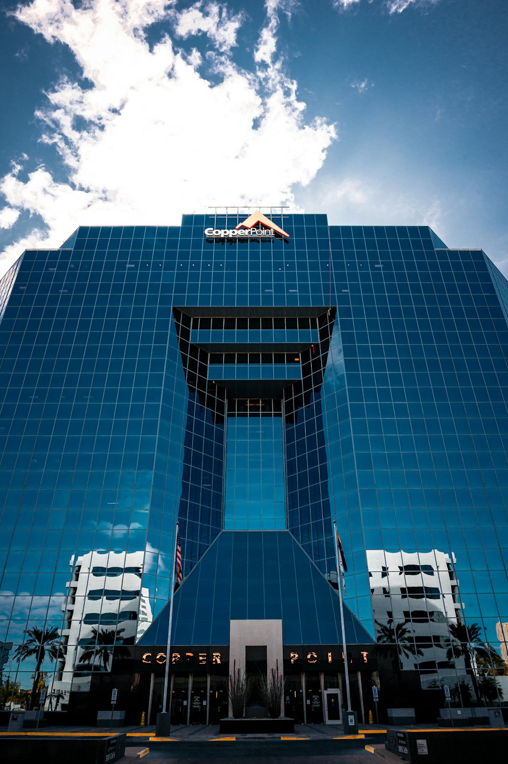 white and blue building under blue sky during daytime