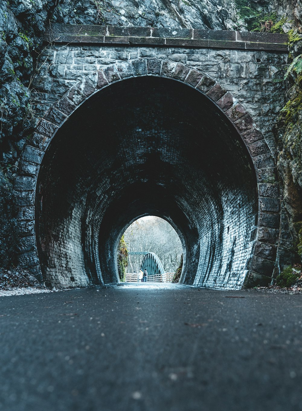 tunnel with water during daytime