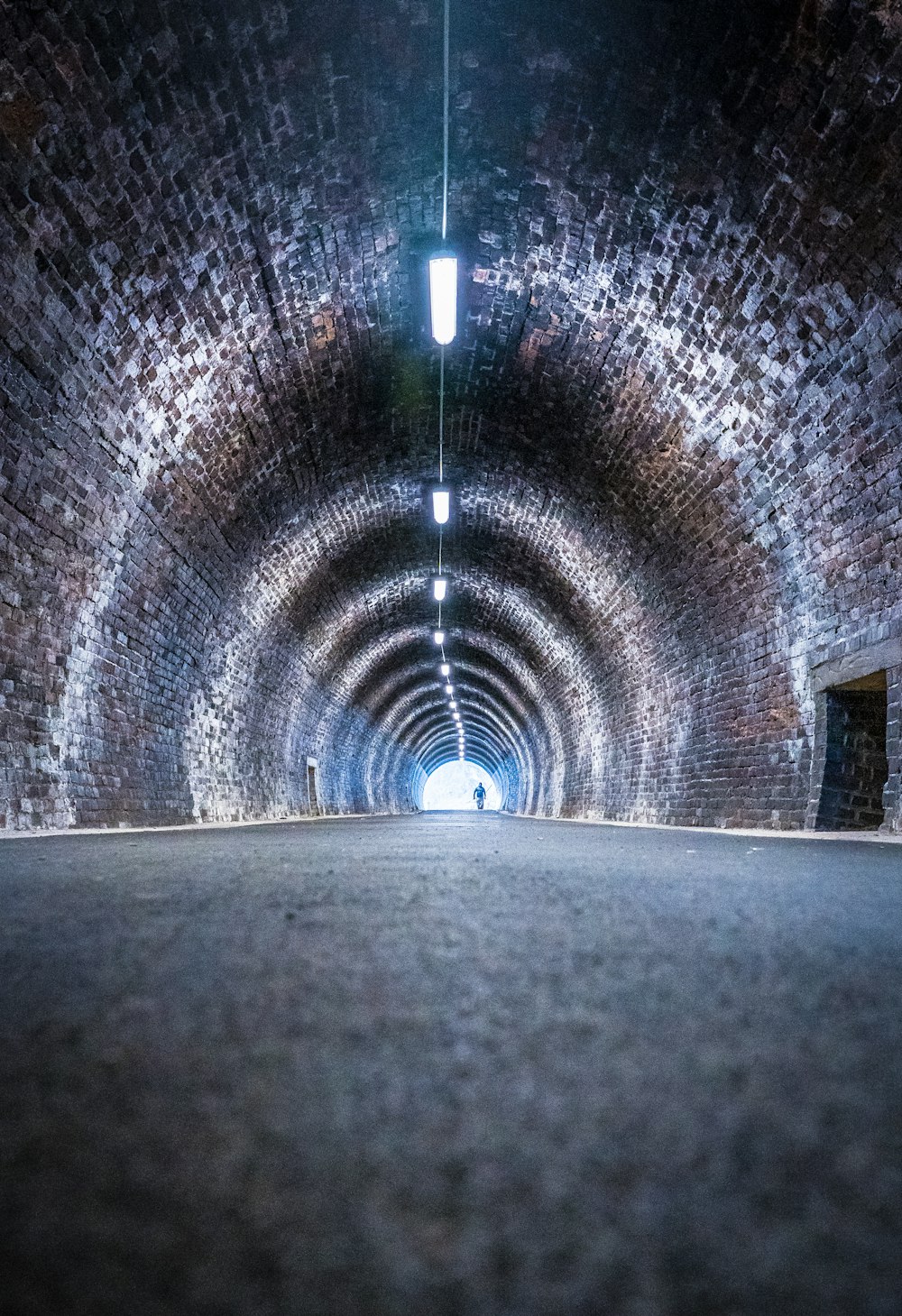 tunnel with light turned on during night time