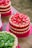 pink and green cake on pink and white table cloth