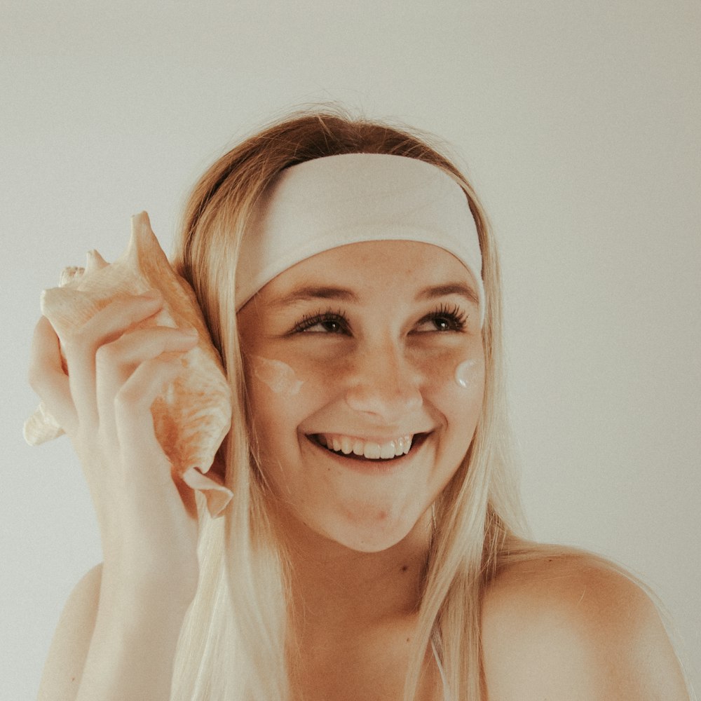 smiling woman with white hair