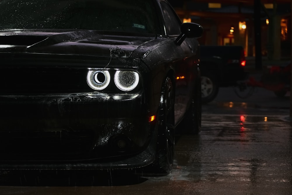 black bmw m 3 on road during night time