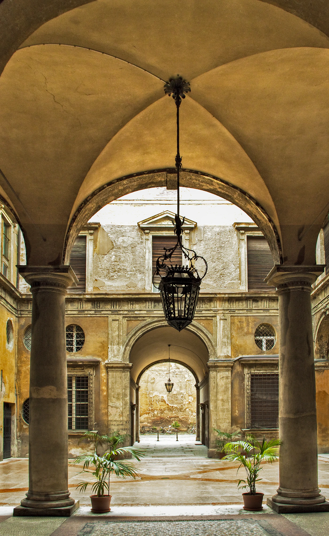 An Italian palazzo courtyard restored as a hotel