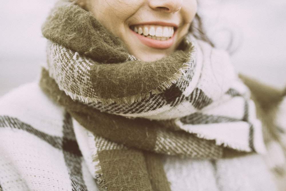 woman in white and black scarf