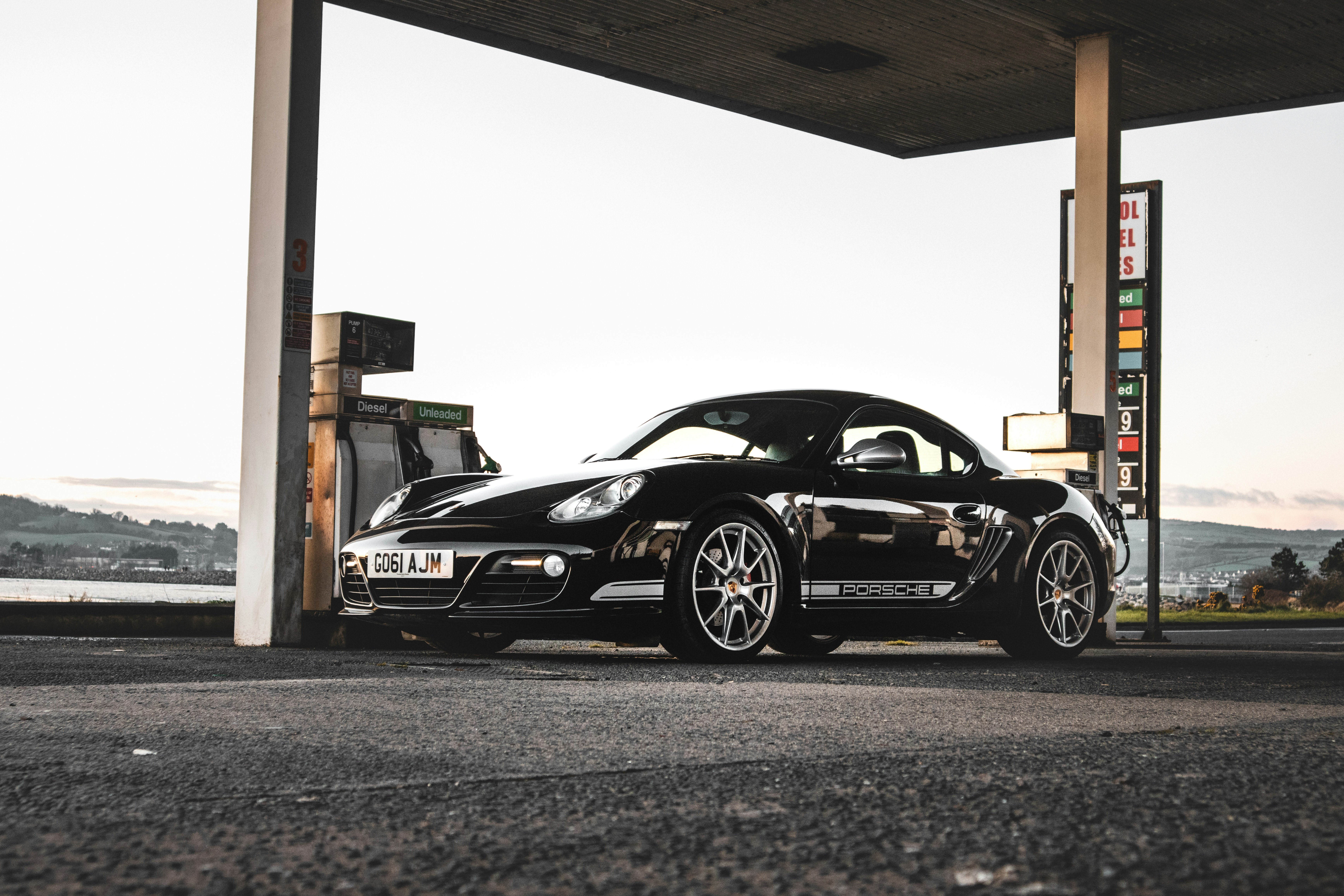Black Porsche 911 Parked In Garage Photo Free Automobile Image On Unsplash
