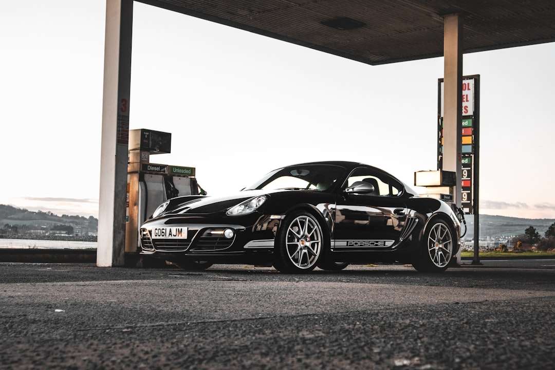 black porsche 911 parked in garage