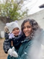 2 women smiling while taking photo