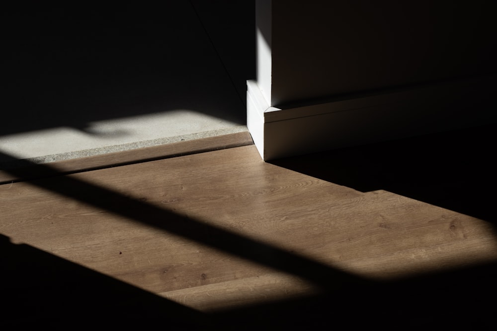 white wooden frame on brown wooden table