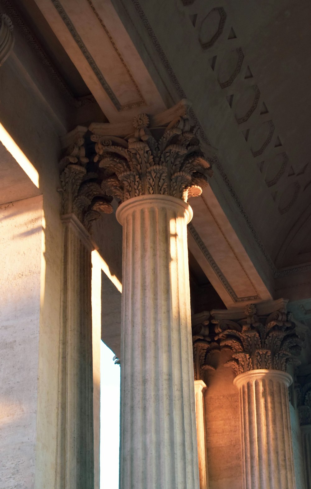 white concrete pillar on gray concrete floor