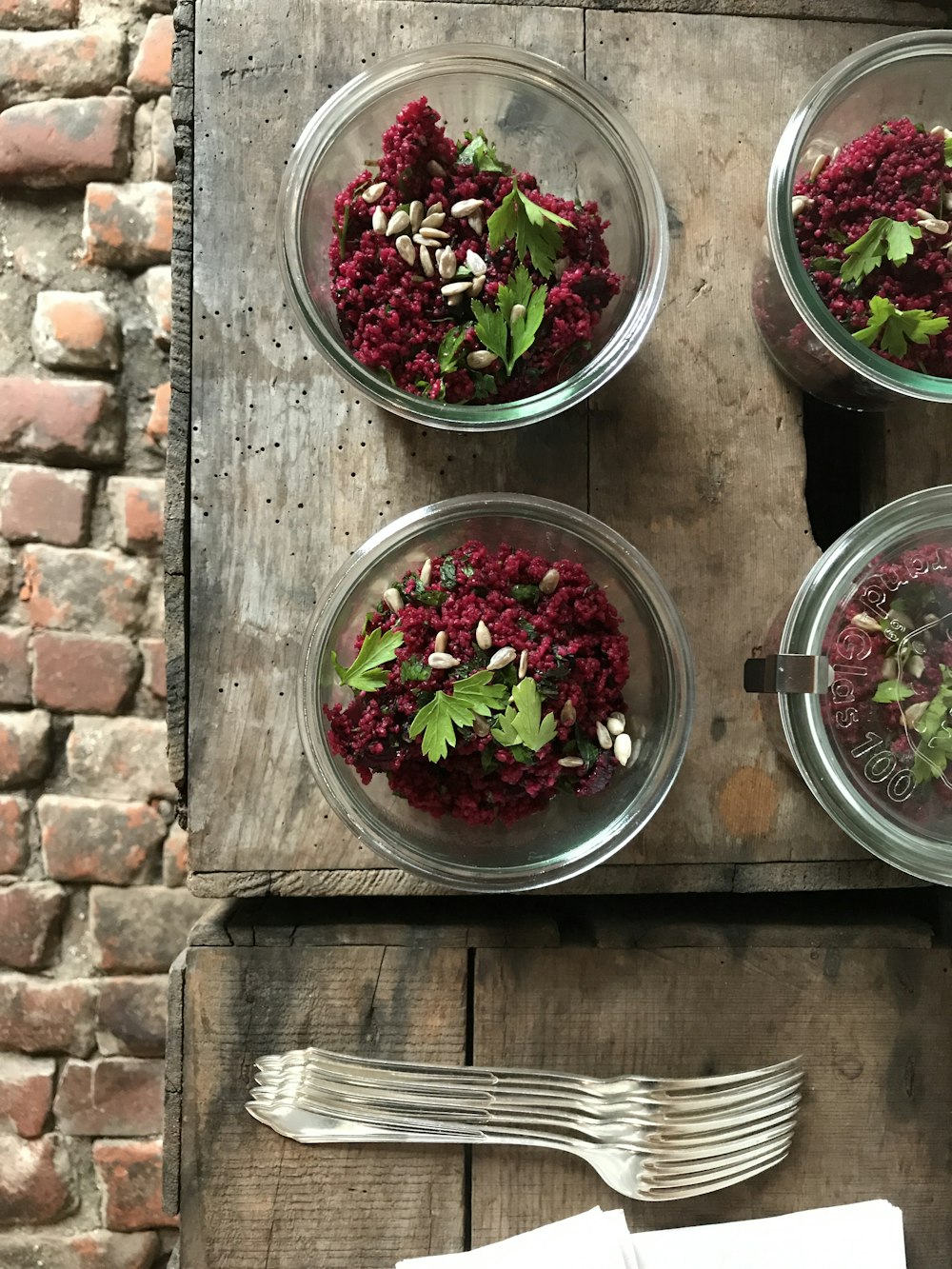 red and green leaves in clear plastic containers