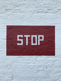 red and white no smoking sign