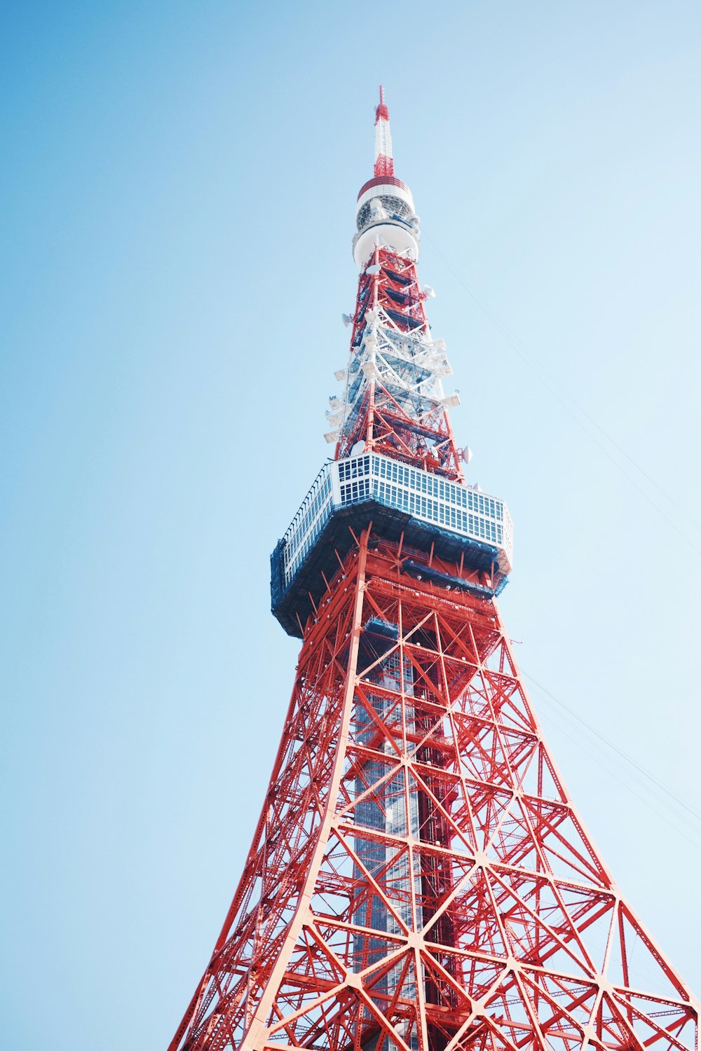 red and white tower under blue sky