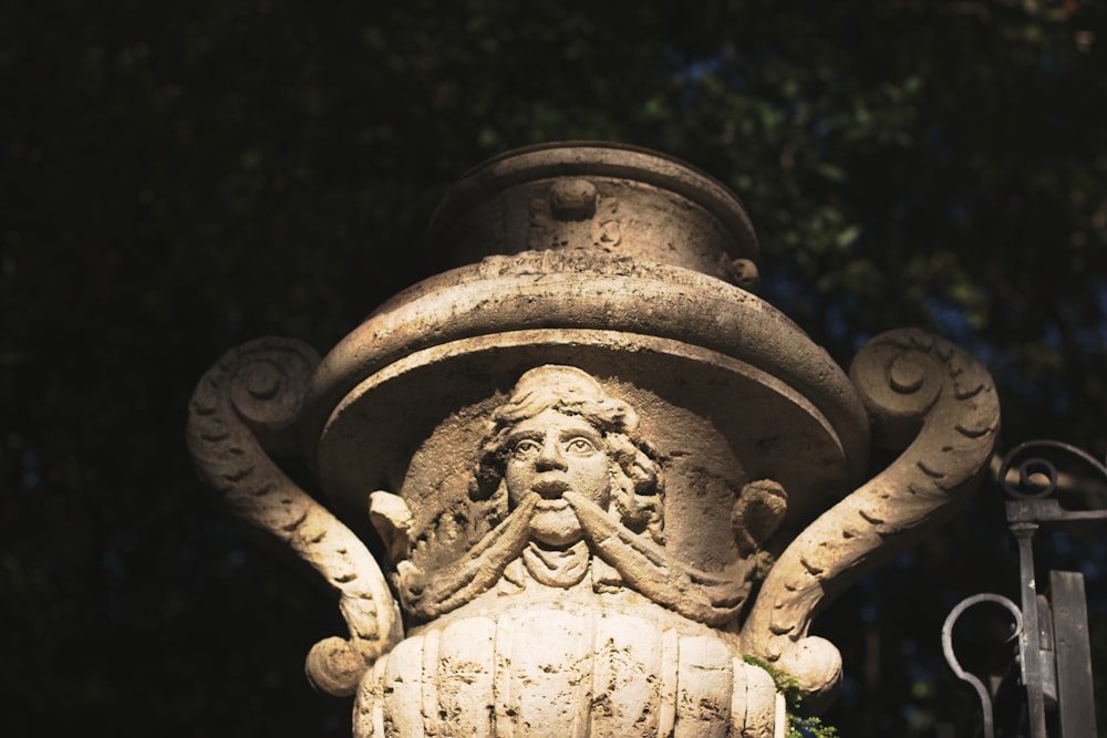 gray concrete statue during daytime