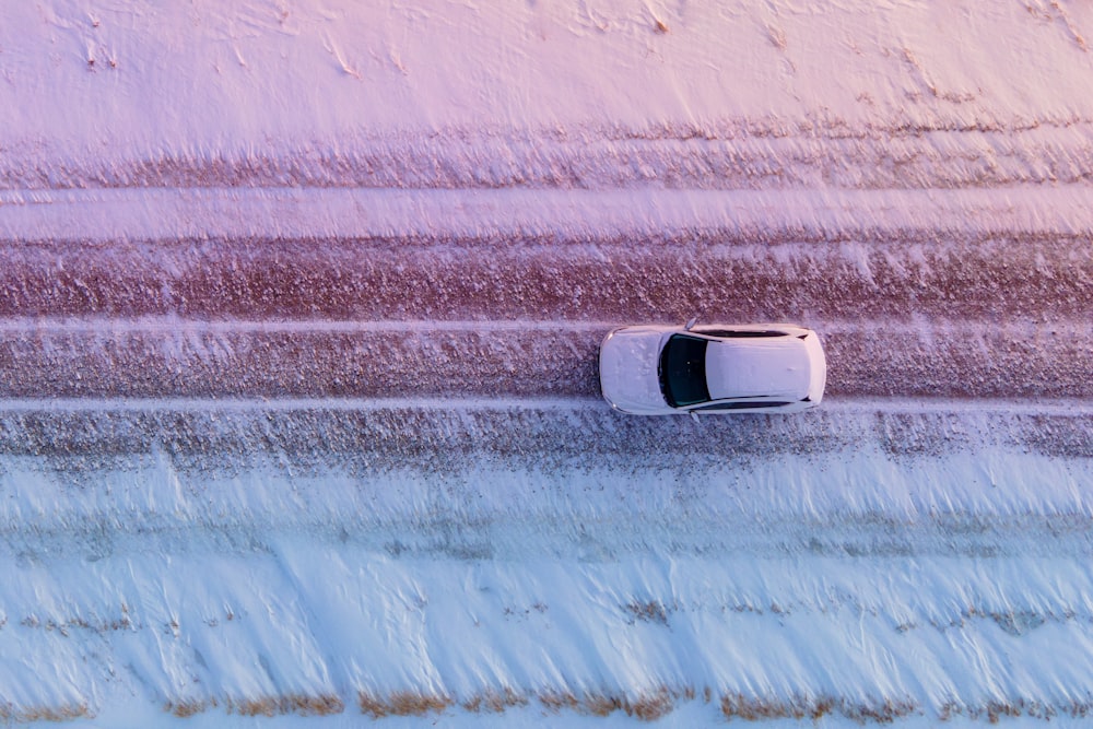 white car on road during daytime