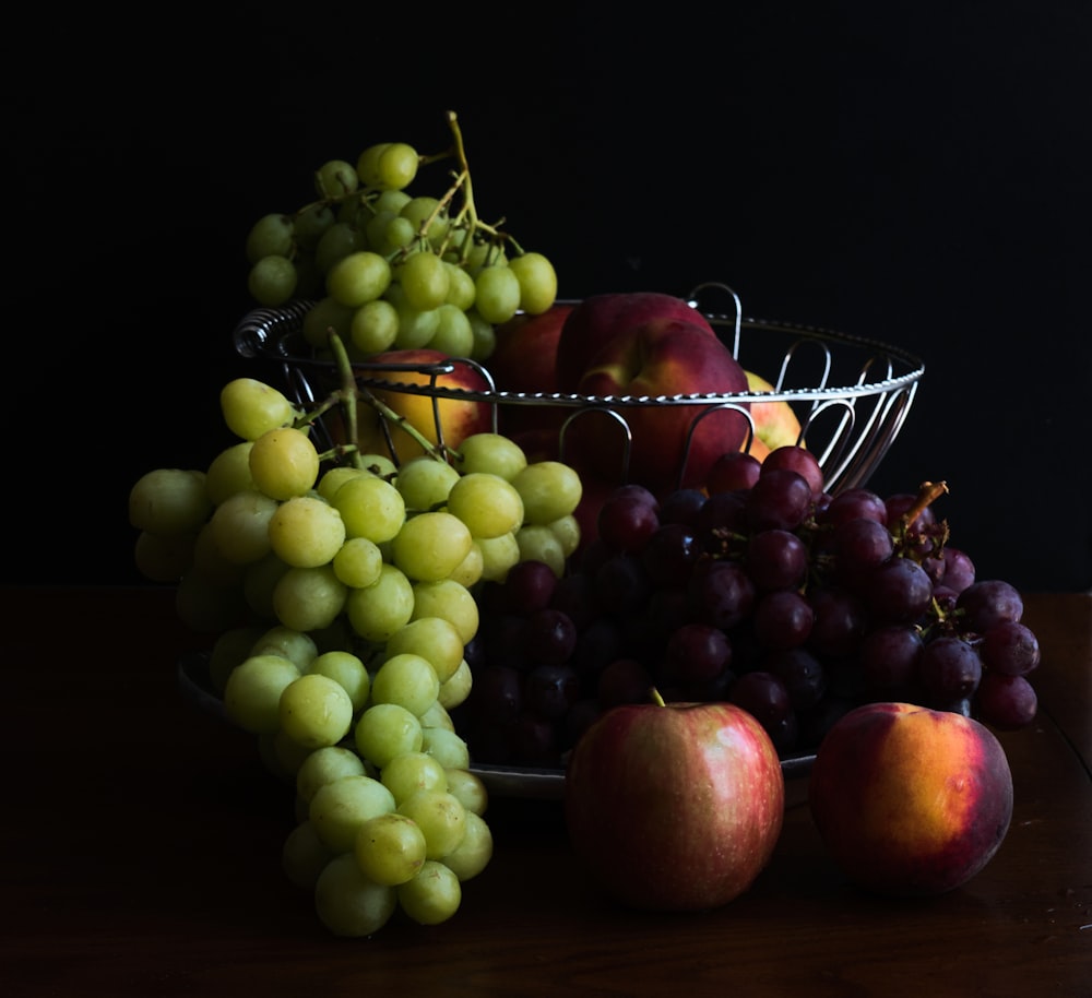 red apples on white metal rack