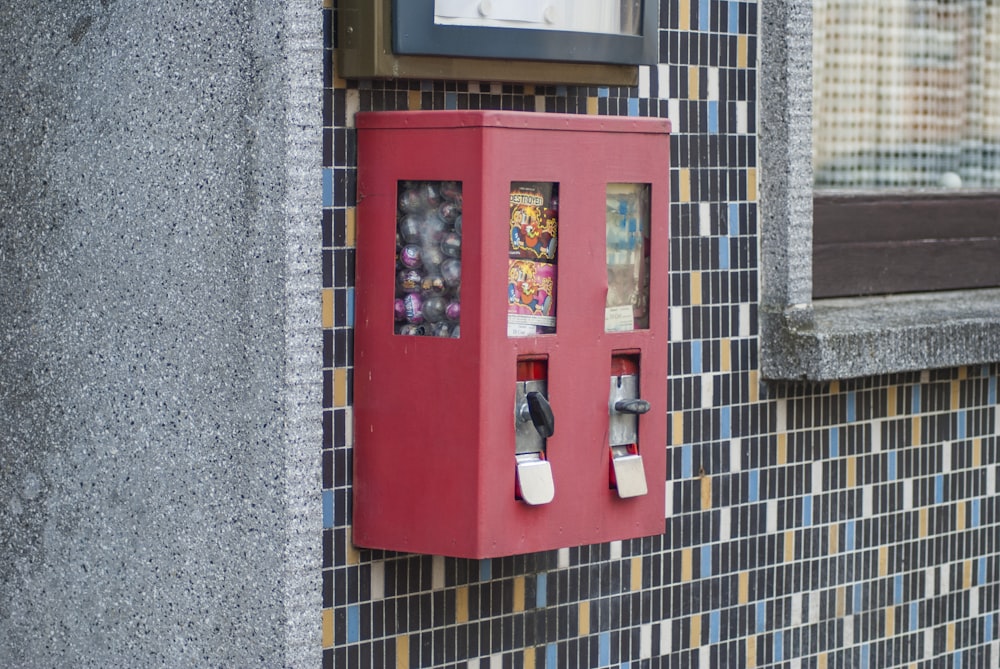 red and black telephone booth