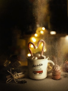 white ceramic mug with fire