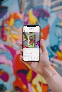 person holding white iphone 5 c