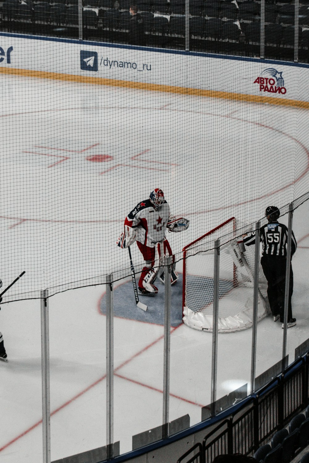 2 men playing ice hockey