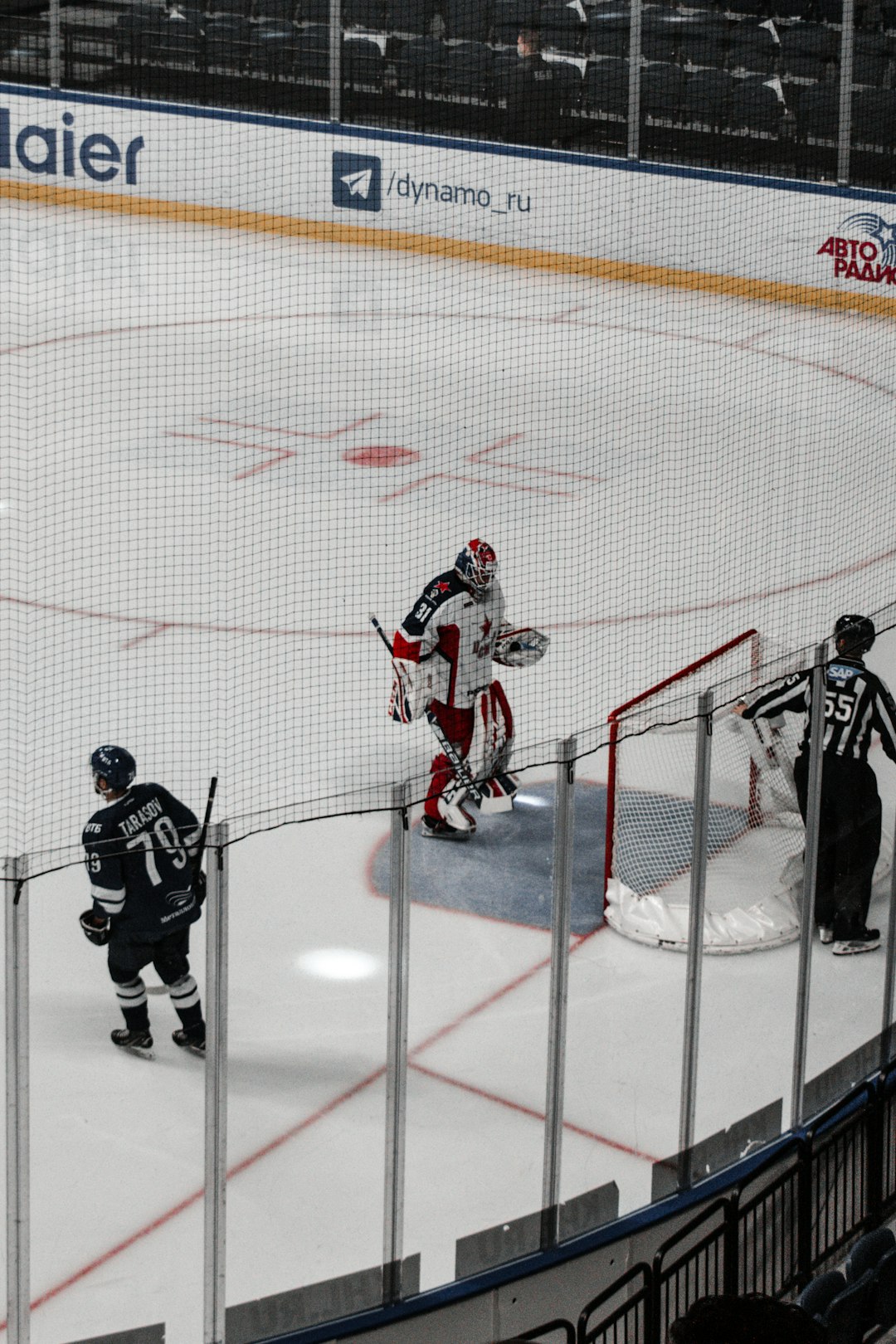 ice hockey players on ice hockey field