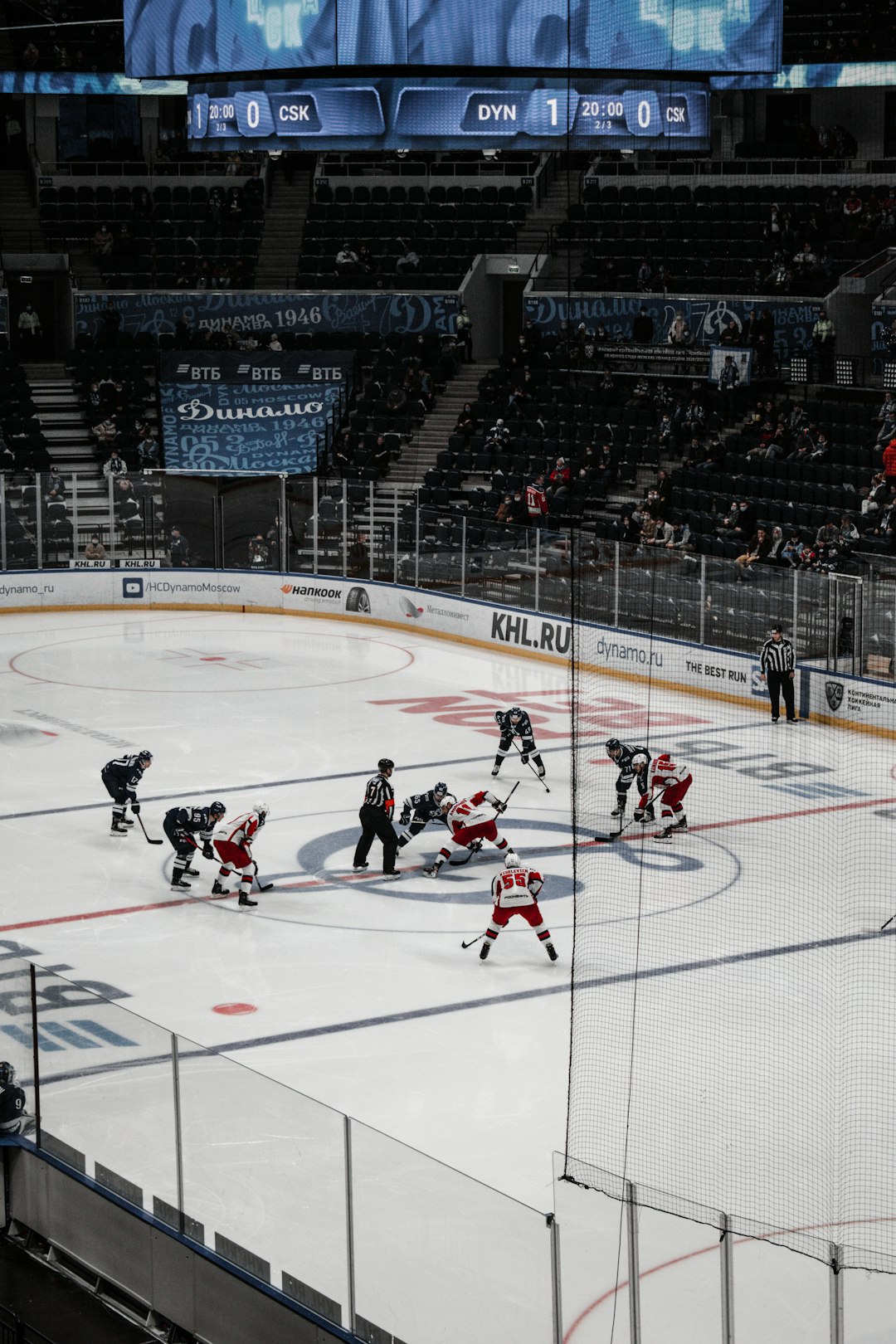 people playing ice hockey on stadium