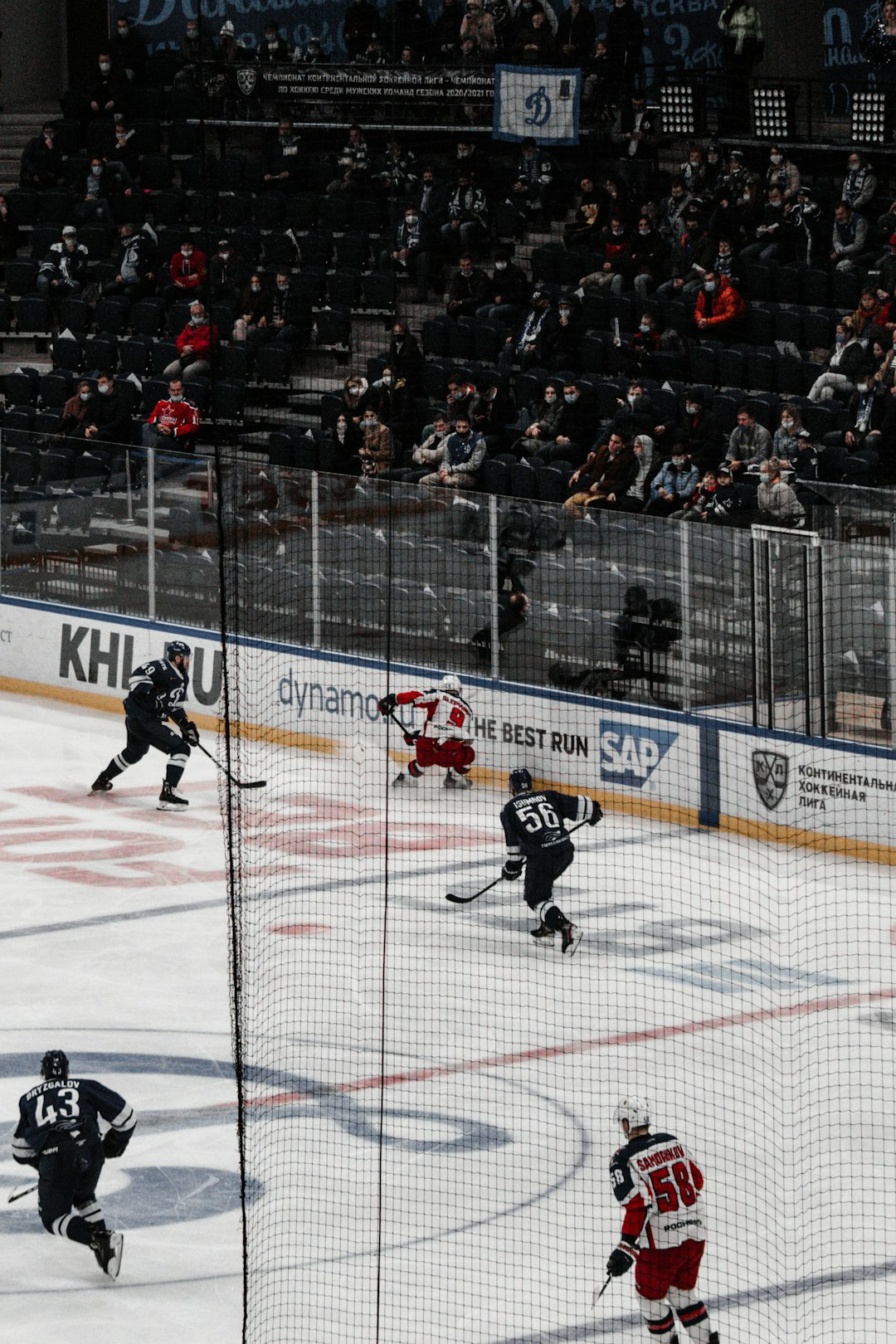 ice hockey players on ice hockey field